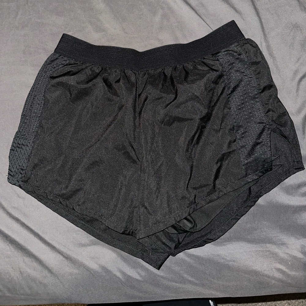 black athletic shorts- size L
